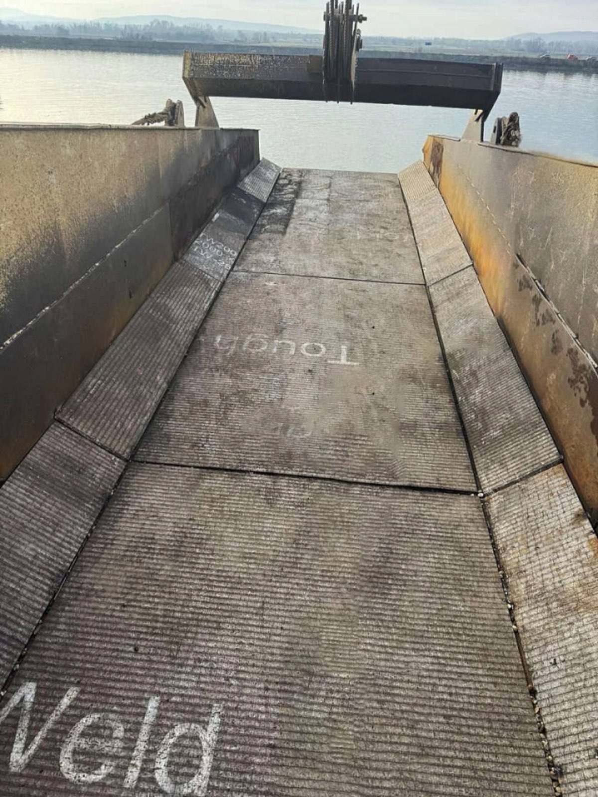 Barge loading ramp clad edge to edge in TW200 plates
