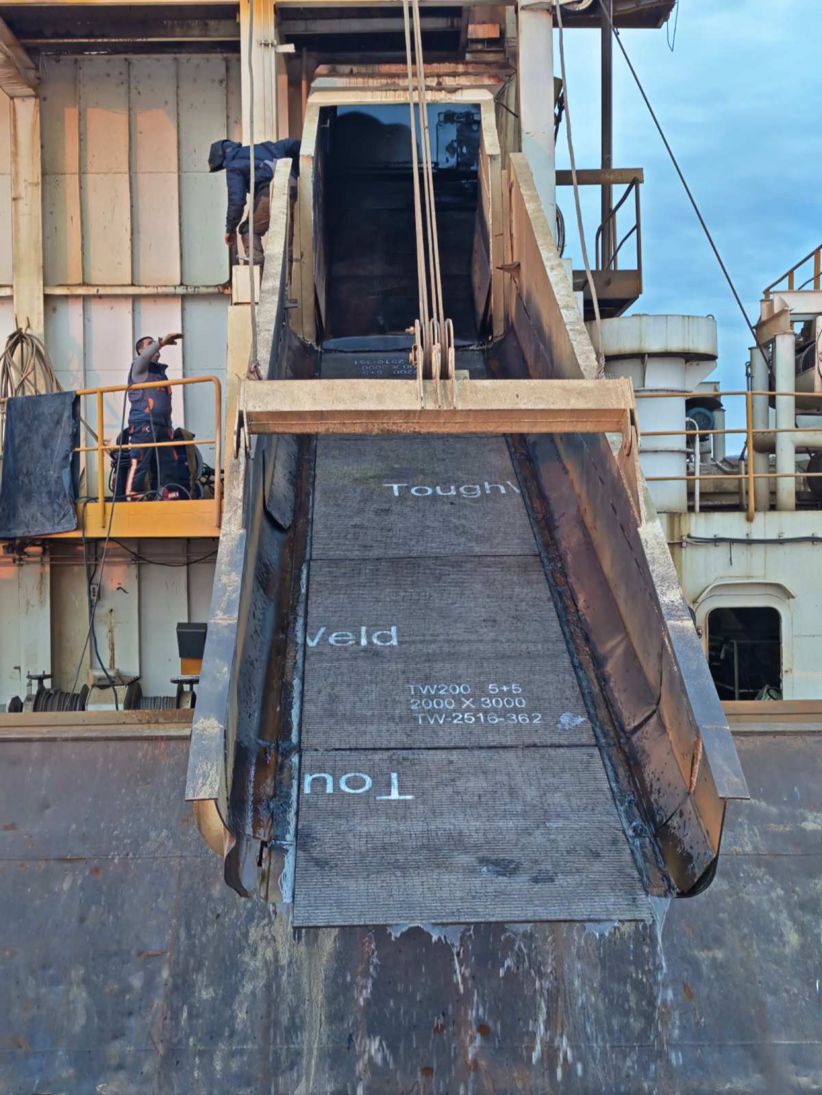 Ship loader chute lined with TOUGHWELD-stencilled wear plates